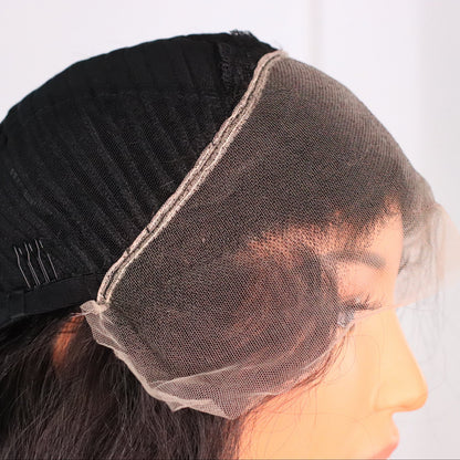 Close-up of Natural Wavy human hair wig showing the HD lace front, hairline and lace construction