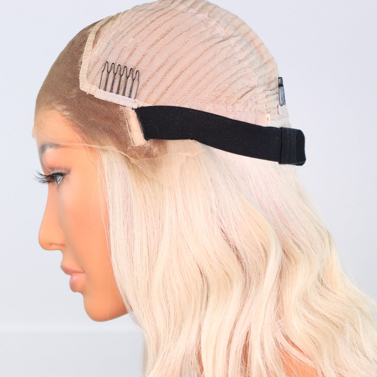 Side view of Vixen Frost lace front wig showing HD lace construction and narrower lace area at the temple