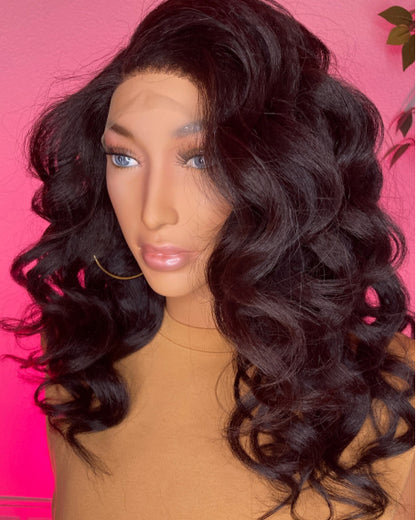 18" Kinky Straight Lace Closure Wig display. Hair-styled with wand curls Only sold at SL Raw Virgin Hair