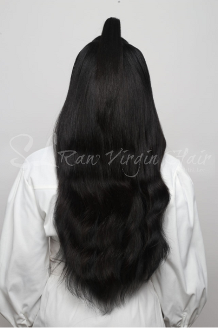 Back of the Raw natural wavy hair bundles in 20 inch by SL raw virgin hair 