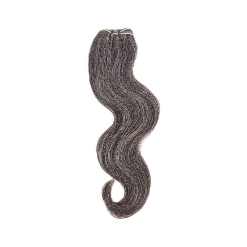 Displayed is SL Raw Virgin Hair Salt and Pepper gray hair vietnamese human hair bundles with a slight wave. beautiful hair wefts for a perfect sew in or pronto weave 